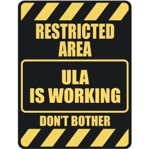   RESTRICTED AREA ULA IS WORKING  PARKING SIGN