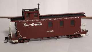   MODELS P.N. B340952 D&RGW 0505 LONG CABOOSE FLYING GRANDE HERALD