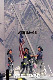 FIREMAN RAISE US FLAG WORLD TRADE CENTER PHOTO NEW YORK  