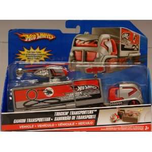    Hot Wheels Truckin Transporters with Motorcycle Toys & Games