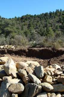   placer workings on a major project adjacent to the Goldwater claims