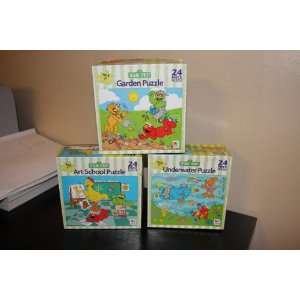  Three Sesame Street Puzzles featuring Elmo, Oscar, Zoe 