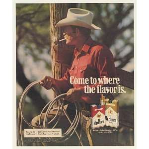  1983 Marlboro Man Cowboy Smoking Holding Rope Print Ad 