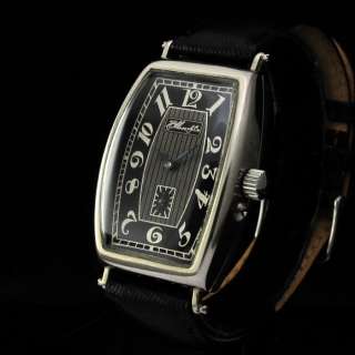 It is fitted on a new 20mm black snake skin genuine leather strap with 