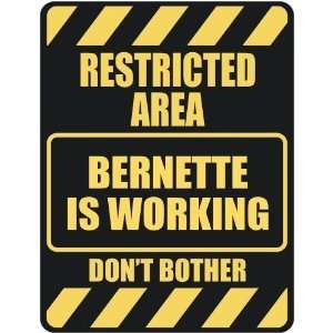   RESTRICTED AREA BERNETTE IS WORKING  PARKING SIGN