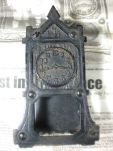   Iron Rare Hall Clock Bank Made by Arcade with newspaper provenance