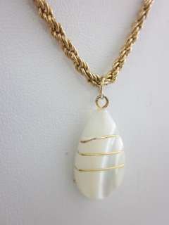 on a NEW DESIGNER Gold Tone Mother of Pearl Teardrop Pendant Necklace 