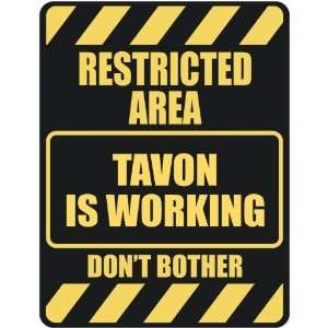   RESTRICTED AREA TAVON IS WORKING  PARKING SIGN