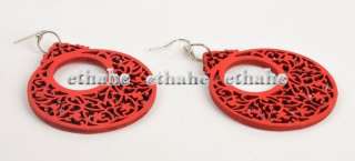 Elegant red colored cutout pattern as the pendent of the earring 