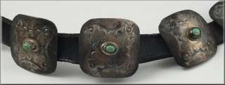 this wonderful small size navajo belt is decorated with eleven silver 