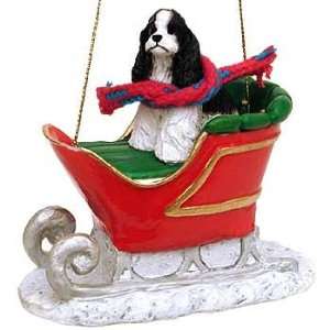  Black and White Cocker in a Sleigh Christmas Ornament 