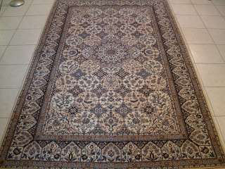 Examples of Persian rug #1192 on 4 different types of floors