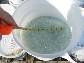 See Pictures. SOLD PER 5 Gal Bucket. Various size glass balls for 