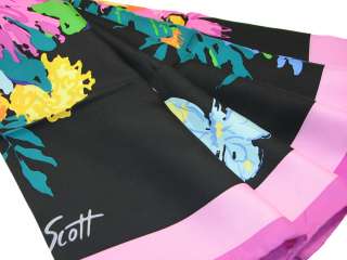   this is a new authentic ken scott silk scarf the black background