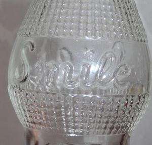 Salesman Sample ? Smile Soda, Embossed 2½ oz. Miniature Bottle, July 