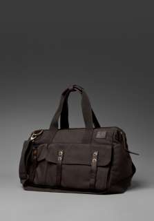 MILLICAN Harry the Gladstone Overnight Bag in Slate Green at Revolve 