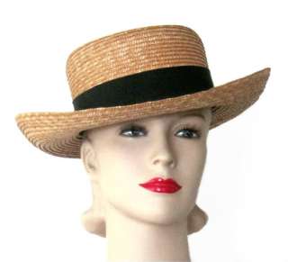 Classic natural straw hat with black grosgrain ribbon and bow by 