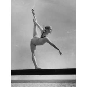  Gymnast Cathy Rigby, Training on Balancing Beam Stretched 