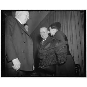   Secretary of Labor Frances Perkins went into a huddle