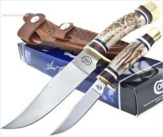 Both knives have genuine stag horn handles with brass bolsters and 